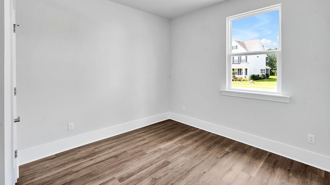 Spacious, unfurnished interior of a new home in The Haven at Indigo Preserve, Leland (Image 21).