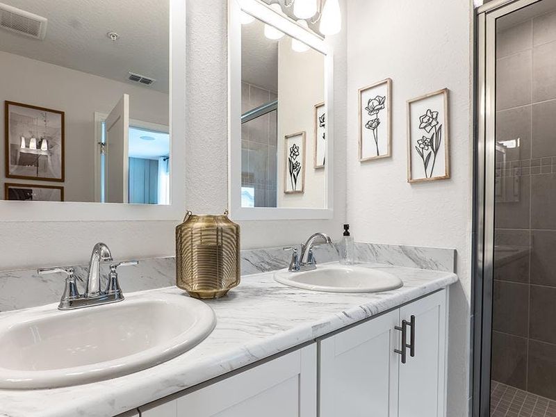 Your suite includes a spacious en-suite bath - Daisy townhome by Highland Homes