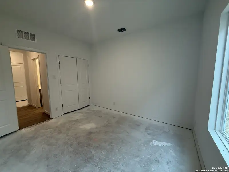 In-progress construction of a new home in Meadows at Hennersby Hollow 40's, San Antonio, TX (Image 25).