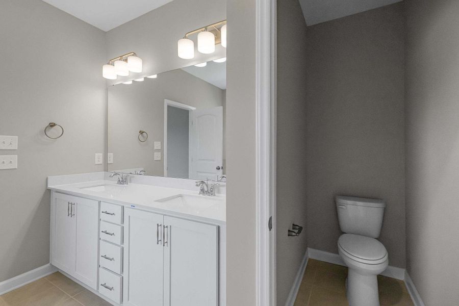 Representative furnished interior of a home built from the Clayton by Caviness & Cates Communities in Bartlett Manor, Youngsville (Image 181).