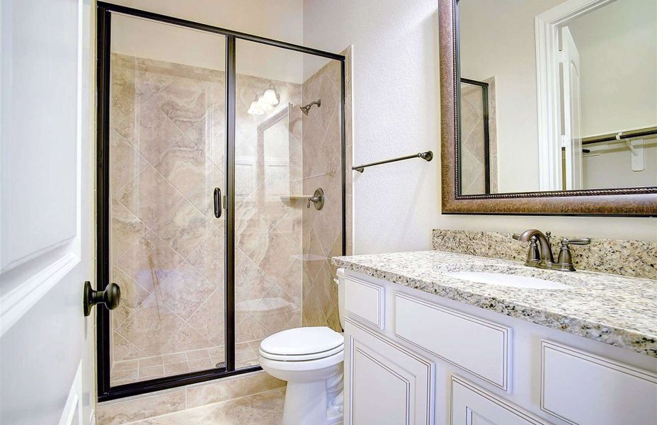 Representative furnished interior of a home built from the 3710 by Ravenna Homes in Artavia 70′, Conroe (Image 11).