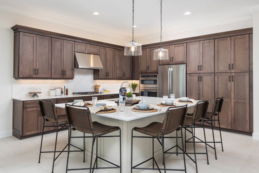 Representative furnished interior of a home built from the Madison by GL Homes in Valencia Parc at Riverland, Port St. Lucie (Image 9).