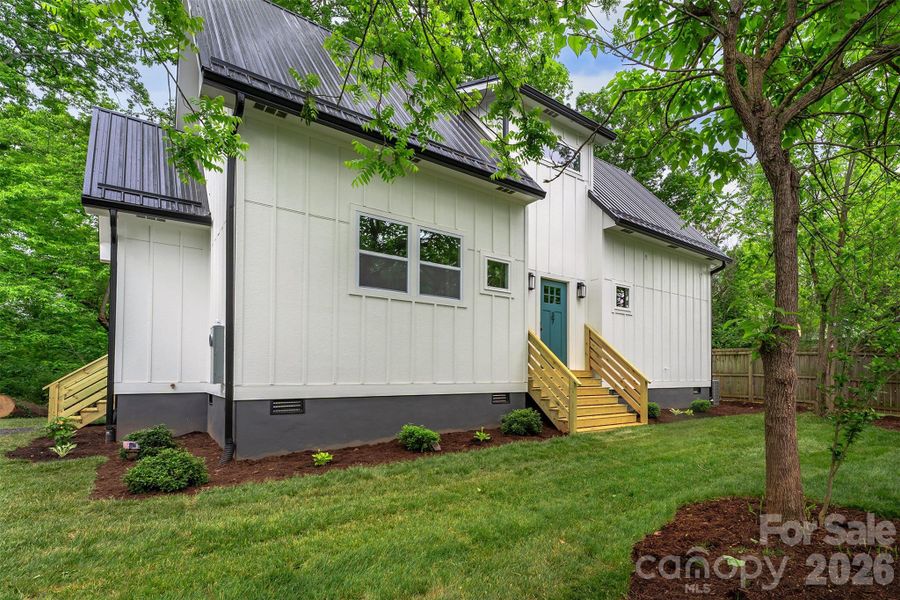 Exterior details and patio area of a home in , Asheville (Image 28).