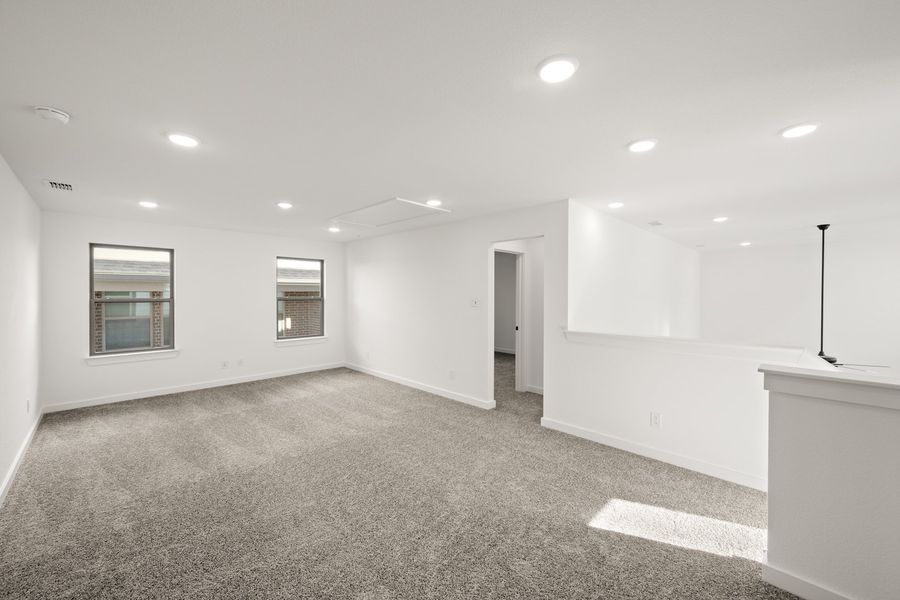 Spacious, unfurnished interior of a new home in Treeline, Justin (Image 24).