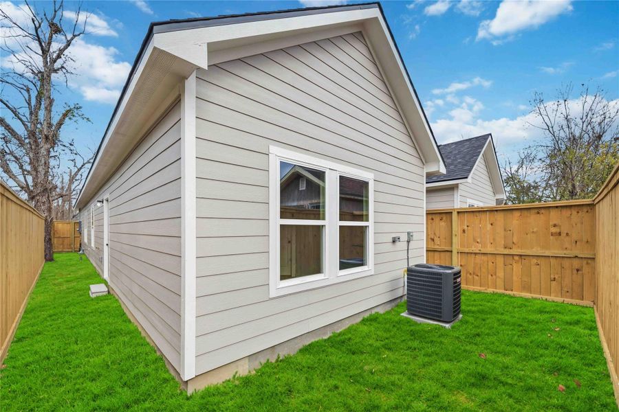 Exterior details and patio area of a home in , Houston (Image 2). Exterior details and patio area of a home in , Houston (Image 2).