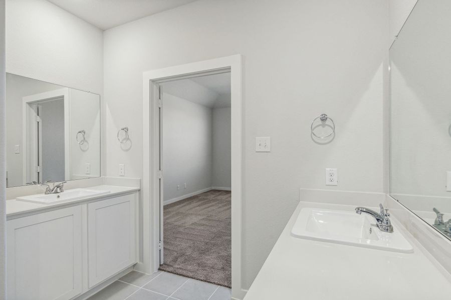 Primary Bathroom in the Willow home plan by Trophy Signature Homes – REPRESENTATIVE PHOTO