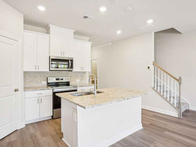 The spacious kitchen makes meal-prep part of your weekly routine.