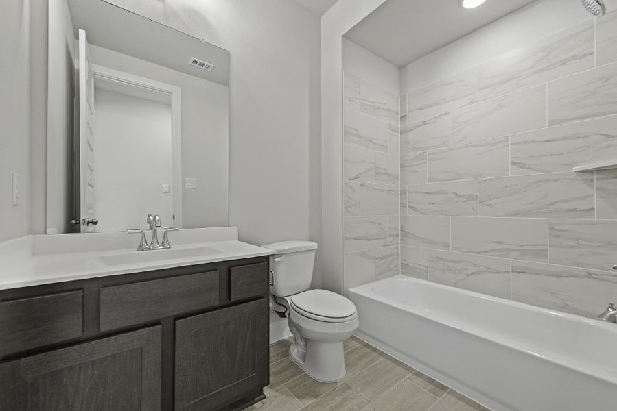 Furnished interior view inside a new home in The Trails, New Caney (Image 12).