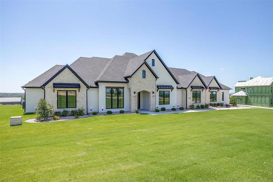 Front exterior of a new home in , Weatherford, TX, highlighting curb appeal (Image 23). Front exterior of a new home in , Weatherford, TX, highlighting curb appeal (Image 23).