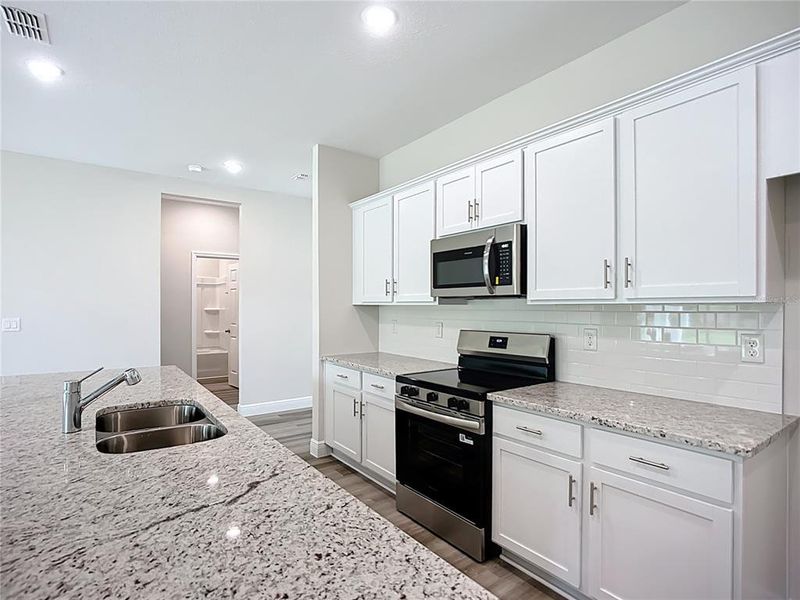 Furnished interior view inside a new home in , North Port (Image 8).