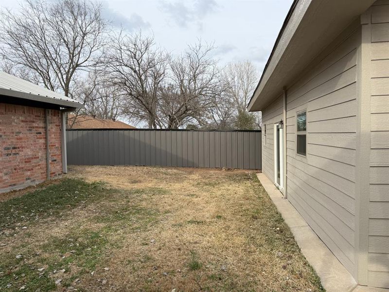 Exterior details and patio area of a home in , Joshua (Image 4).