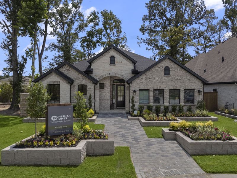Front exterior of a new home in The Highlands, Porter, TX, highlighting curb appeal (Image 20).