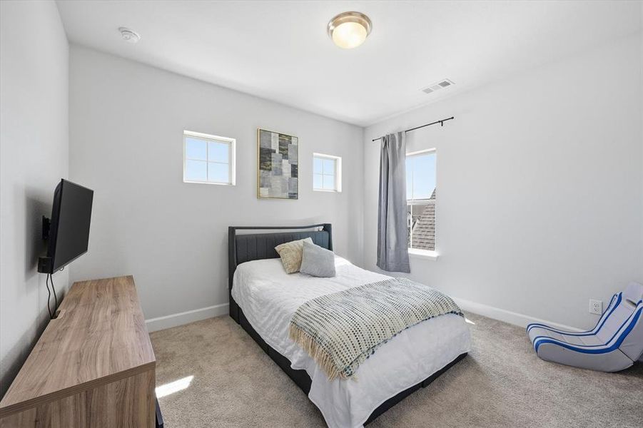 Furnished interior view inside a new home in Mustang Lakes, Celina (Image 28).