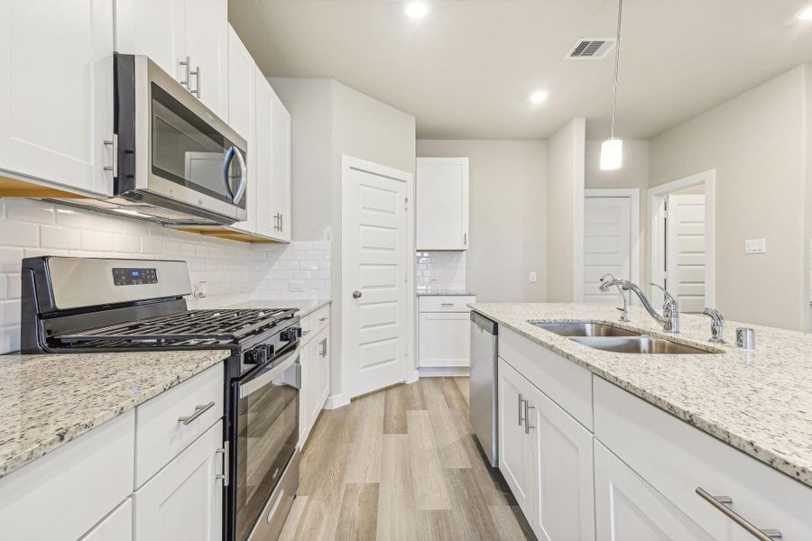 Photo is not of the actual home, but is an inspirational photo of builder’s model home and may depict options, furnishings, and/or decorator features that are not included