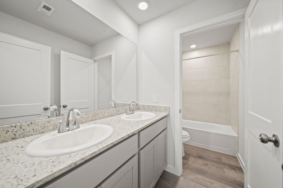 Furnished interior view inside a new home in Riverwood Ranch, Angleton (Image 5).