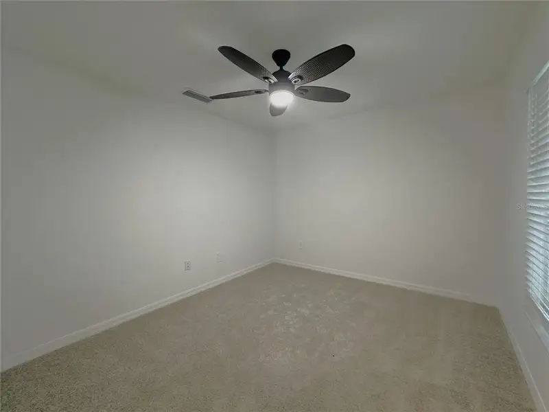 Spacious, unfurnished interior of a new home in , Punta Gorda (Image 19).