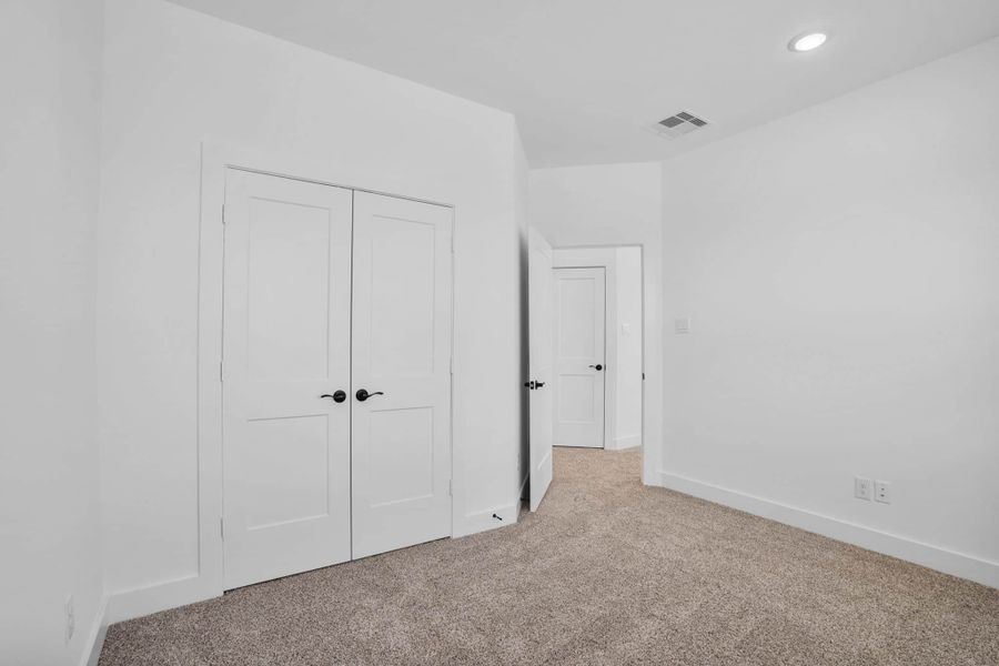 Spacious, unfurnished interior of a new home in Meridiana, Manvel (Image 26).