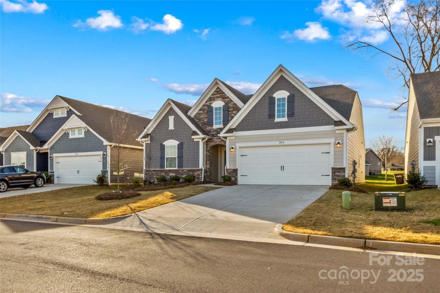 Front exterior of a new home in , Statesville, NC, highlighting curb appeal (Image 20). Front exterior of a new home in , Statesville, NC, highlighting curb appeal (Image 20).