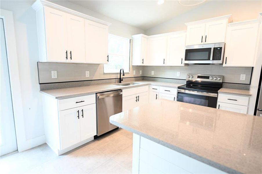Furnished interior view inside a new home in , Dunnellon (Image 3).
