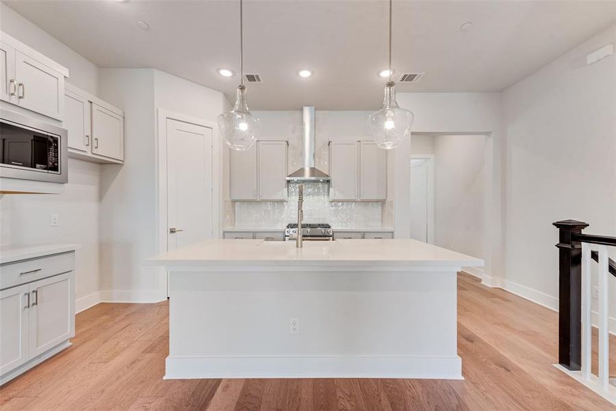 Furnished interior view inside a new home in Collin Creek, Plano (Image 9).