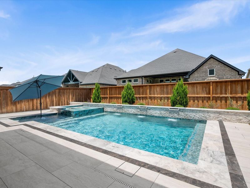 Exterior details and patio area of a home in , Spring (Image 22).