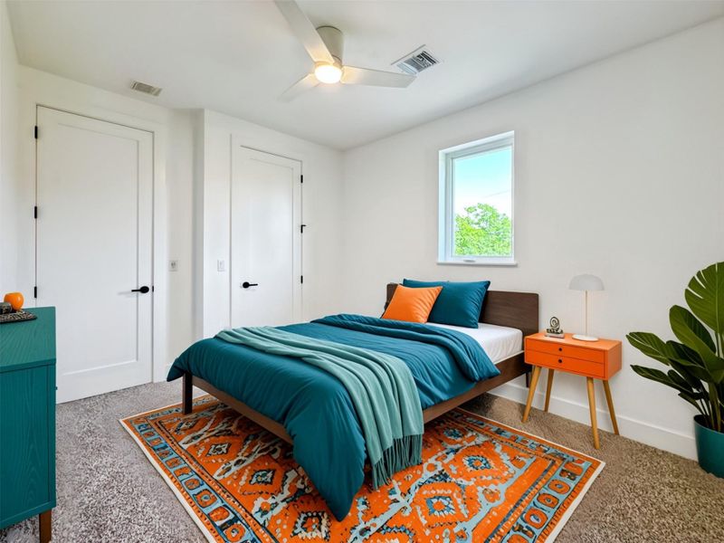 Bedroom featuring carpet flooring, a ceiling fan Bedroom featuring carpet flooring, a ceiling fan