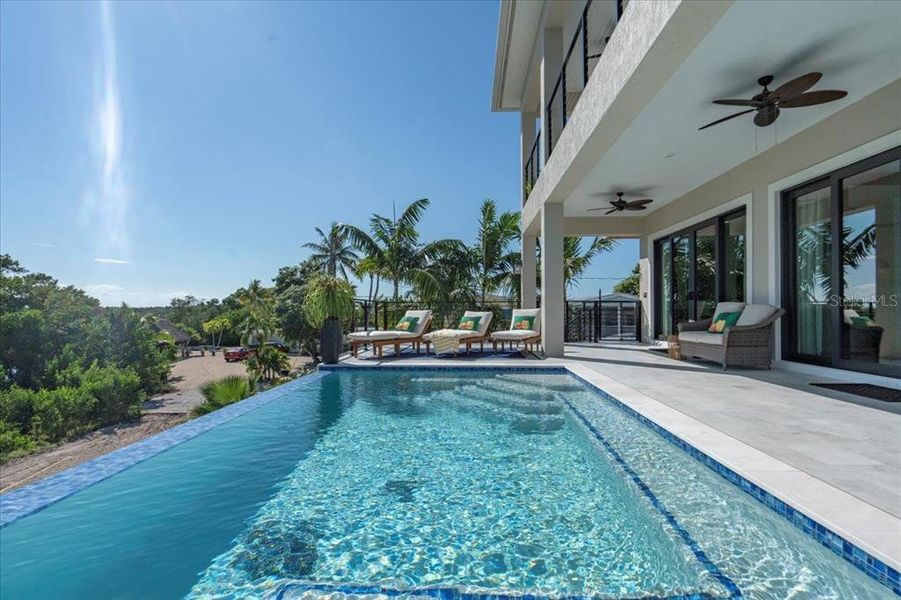 Exterior details and patio area of a home in , Marathon (Image 32). Exterior details and patio area of a home in , Marathon (Image 32).