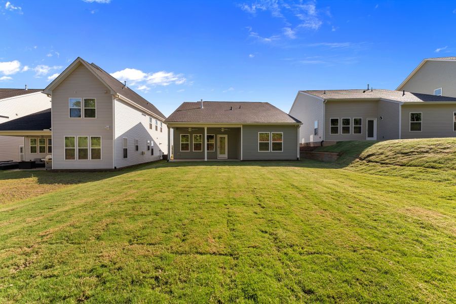 Exterior details and patio area of a home in Landmark Commons, Boiling Springs (Image 3).
