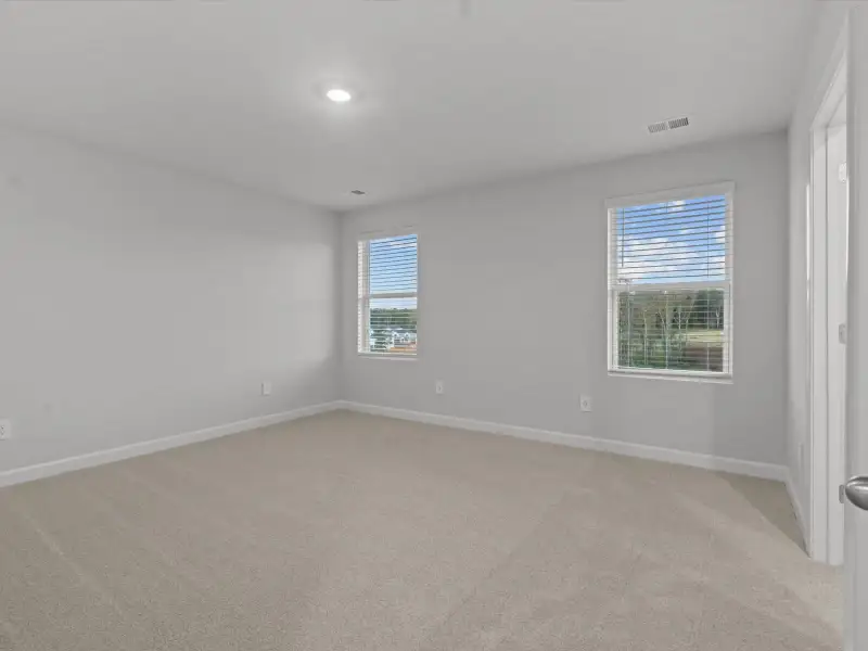 Spacious, unfurnished interior of a new home in The Farm at Wells Creek - Heritage Collection, Gray Court (Image 13).
