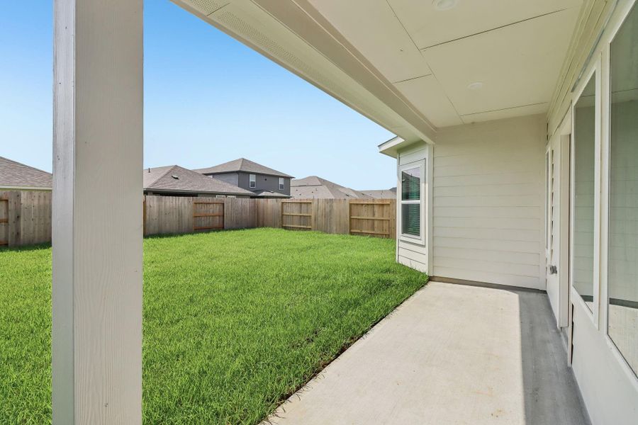 Exterior details and patio area of a home in Riviera Pines - Premier Series, Huffman (Image 22). Exterior details and patio area of a home in Riviera Pines - Premier Series, Huffman (Image 22).