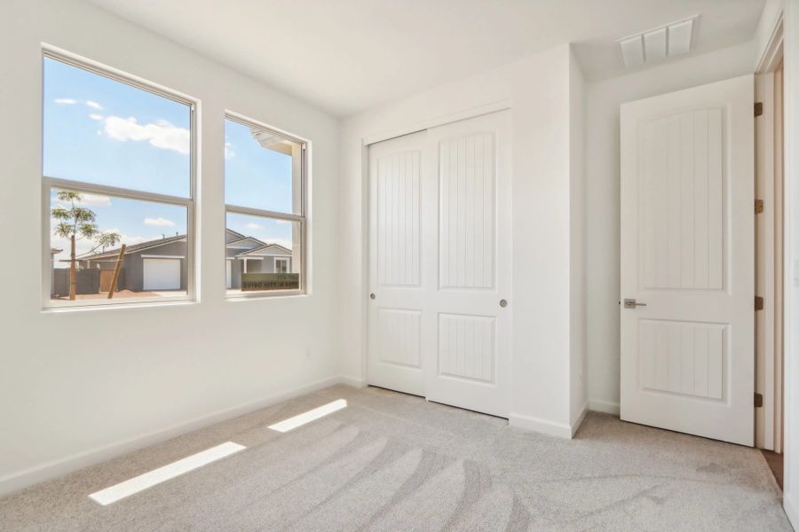 Representative unfurnished interior of a home built from the Opal by Ashton Woods in Marquis at Madera, Queen Creek (Image 6).