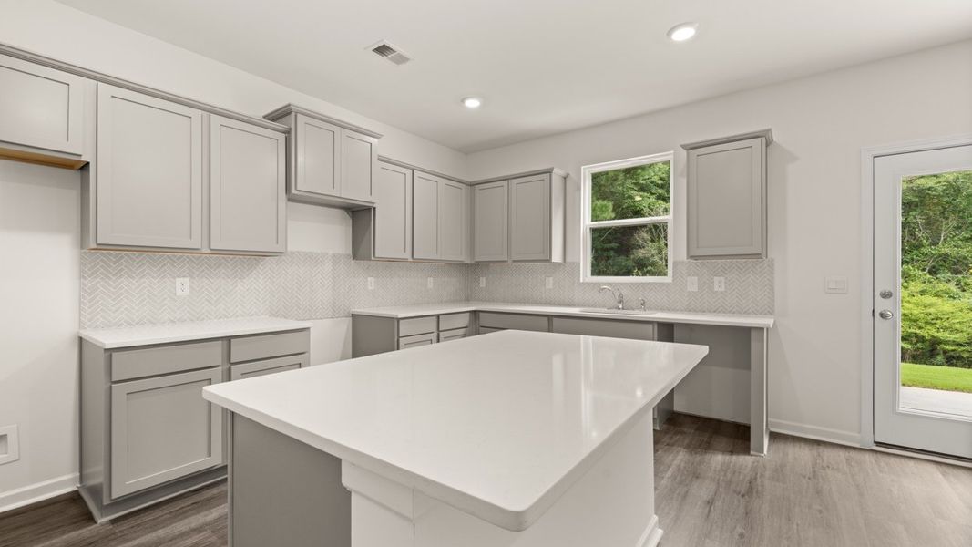 Representative furnished interior of a home built from the Hanover by D.R. Horton in The Reserve at Calcutta, Stockbridge (Image 4).