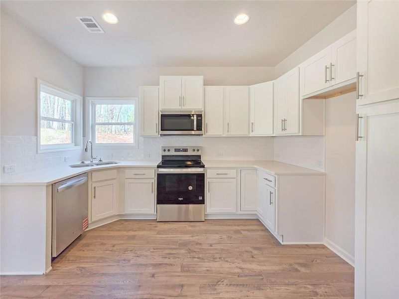 Furnished interior view inside a new home in , Gainesville (Image 8).