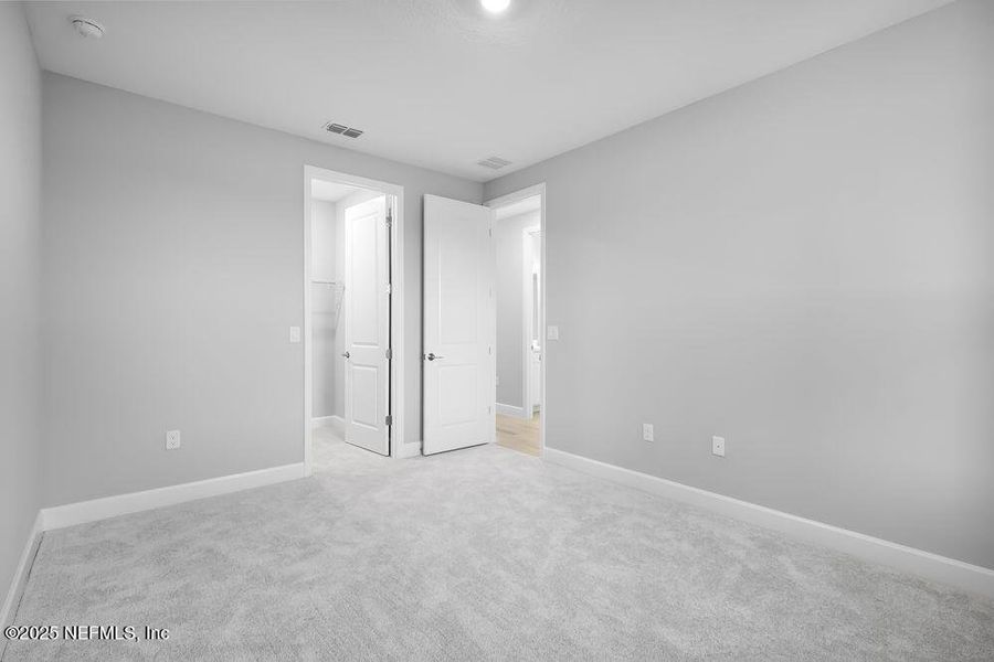 Spacious, unfurnished interior of a new home in Colbert Landings, Palm Coast (Image 17).