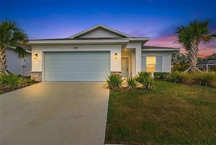 Front exterior of a new home in , Port Charlotte, FL, highlighting curb appeal (Image 23). Front exterior of a new home in , Port Charlotte, FL, highlighting curb appeal (Image 23).
