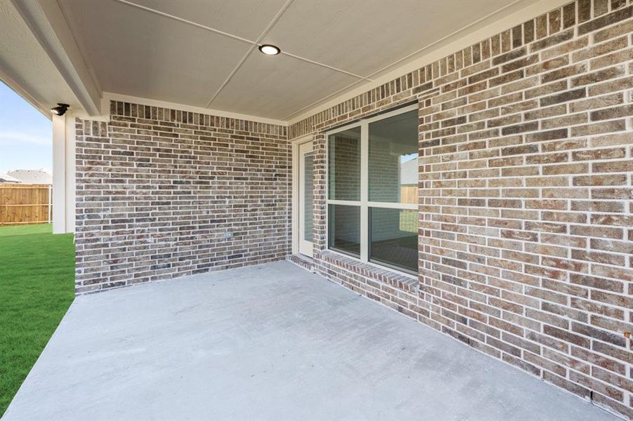 Exterior details and patio area of a home in Meadow Vista 60-65, Anna (Image 27). Exterior details and patio area of a home in Meadow Vista 60-65, Anna (Image 27).