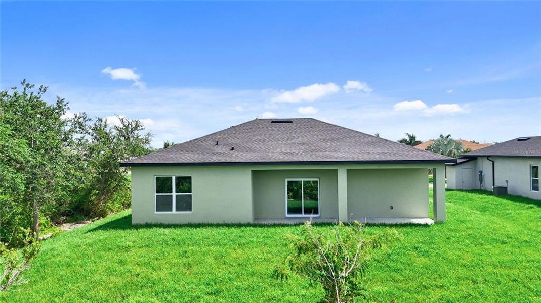 Front exterior of a new home in , Port Charlotte, FL, highlighting curb appeal (Image 19).