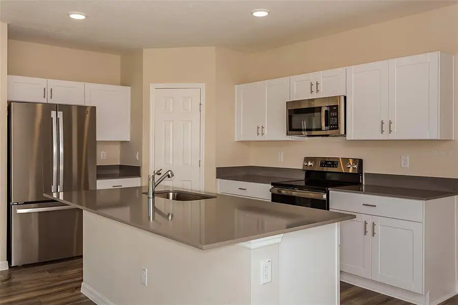 Furnished interior view inside a new home in Pasadena Ridge, Zephyrhills (Image 2).