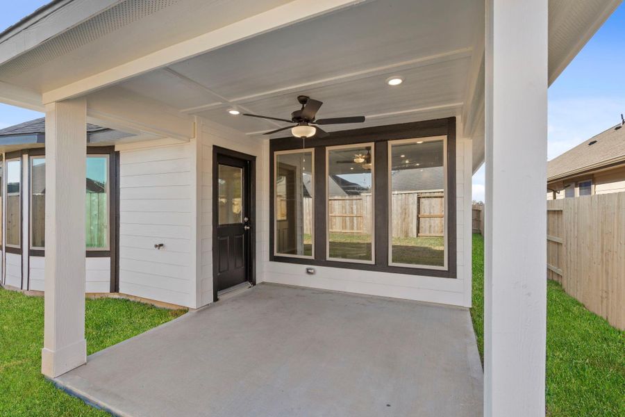 Exterior details and patio area of a home in The Meadows at Imperial Oaks, Conroe (Image 3).