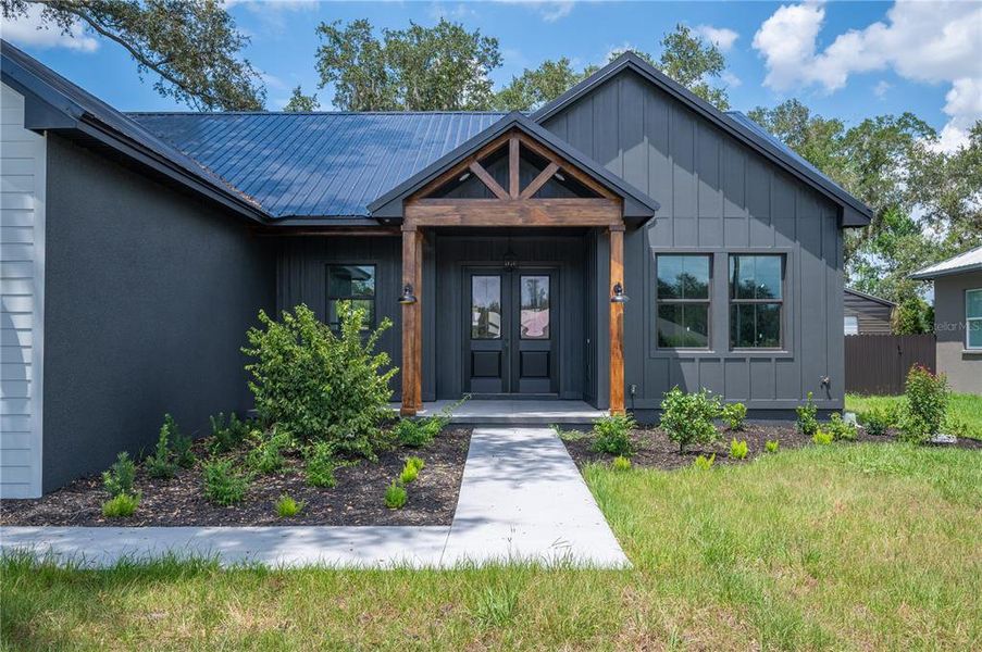 Front exterior of a new home in , Lakeland, FL, highlighting curb appeal (Image 24). Front exterior of a new home in , Lakeland, FL, highlighting curb appeal (Image 24).