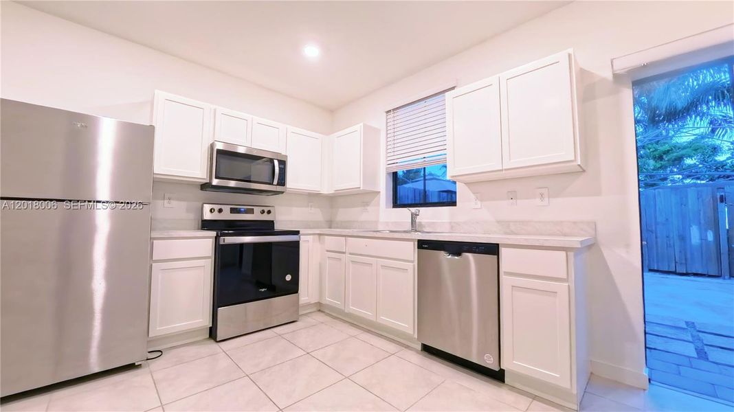Furnished interior view inside a new home in , Florida City (Image 6).