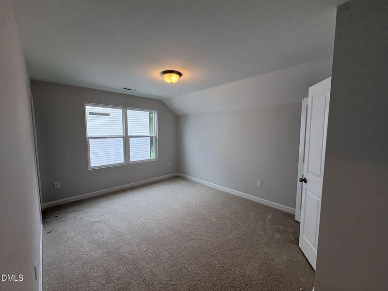 Spacious, unfurnished interior of a new home in Woodland Crossing, Zebulon (Image 20).