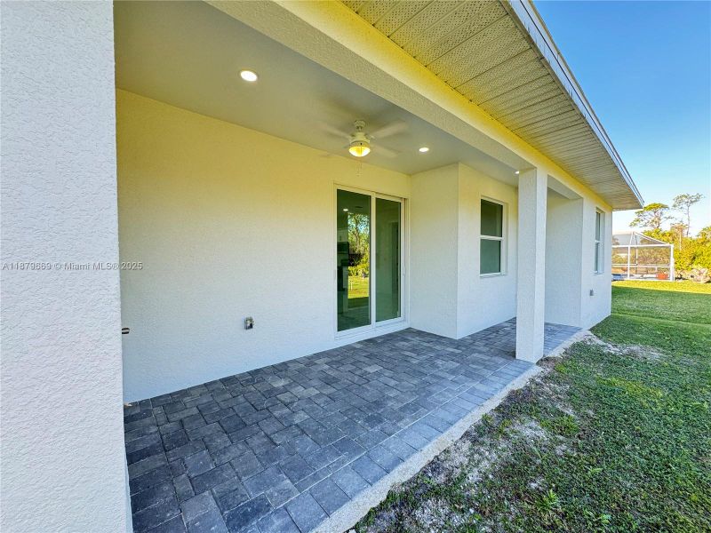 Front exterior of a new home in , Cape Coral, FL, highlighting curb appeal (Image 2).