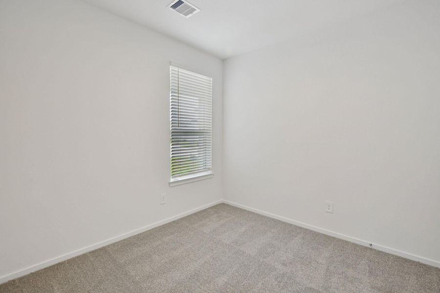 Spacious, unfurnished interior of a new home in Sanford Farms - Traditional Series, Waller (Image 20).