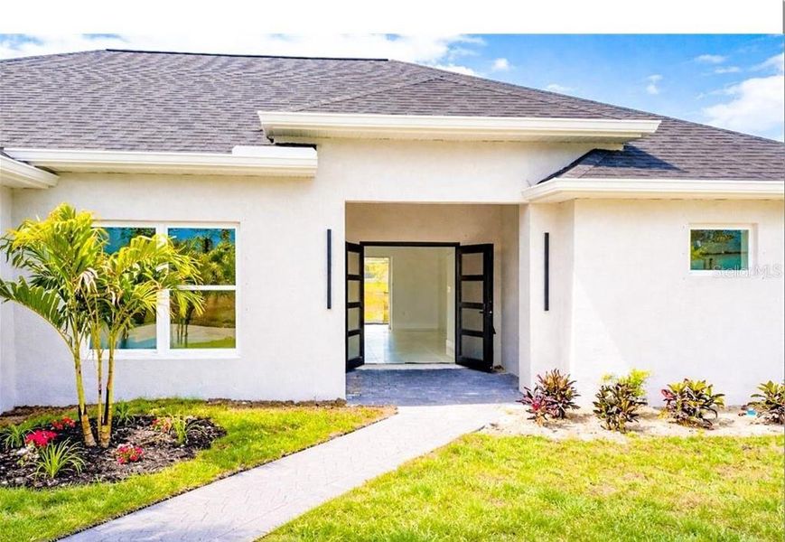 Exterior details and patio area of a home in , Cape Coral (Image 2). Exterior details and patio area of a home in , Cape Coral (Image 2).