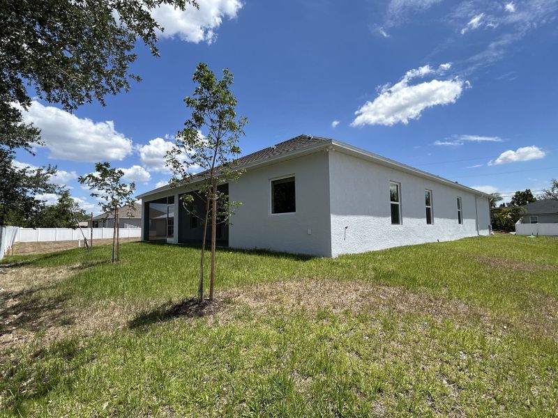 Front exterior of a new home in Burnt Store, Cape Coral, FL, highlighting curb appeal (Image 20). Front exterior of a new home in Burnt Store, Cape Coral, FL, highlighting curb appeal (Image 20).