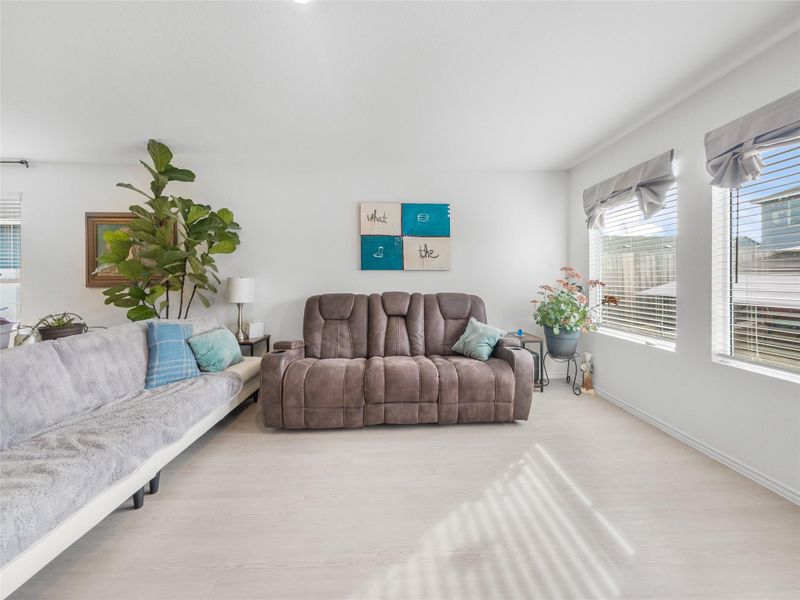 Living room featuring baseboards