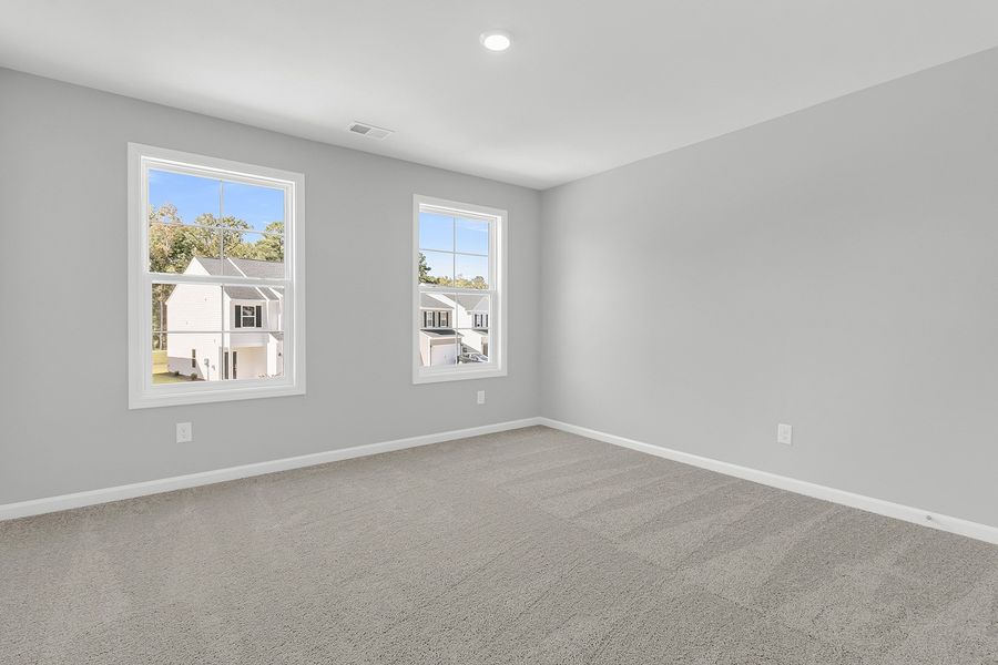 Spacious, unfurnished interior of a new home in Central Creek, Goose Creek (Image 27).