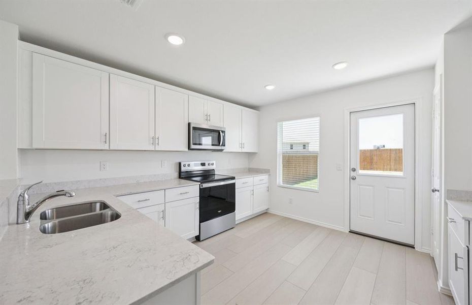 Airy kitchen with ample cabinet space*real home pictured Airy kitchen with ample cabinet space*real home pictured