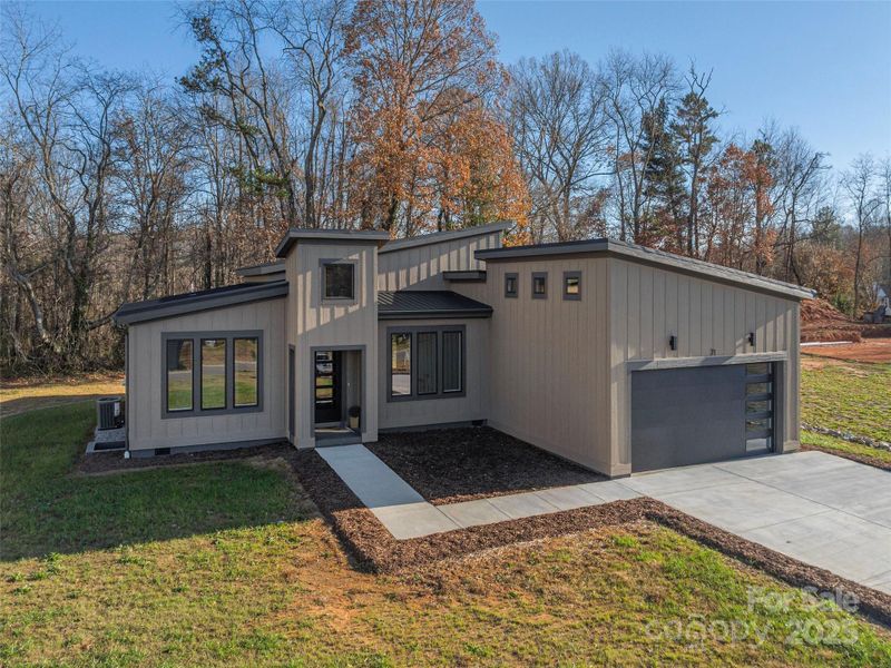 Front exterior of a new home in , Asheville, NC, highlighting curb appeal (Image 19). Front exterior of a new home in , Asheville, NC, highlighting curb appeal (Image 19).